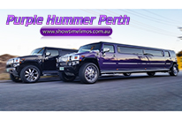 Black Hummer Limousine and Purple Hummer limousine on Perth roads. Full sized limousines for charter hire services by professional limousine drivers.
